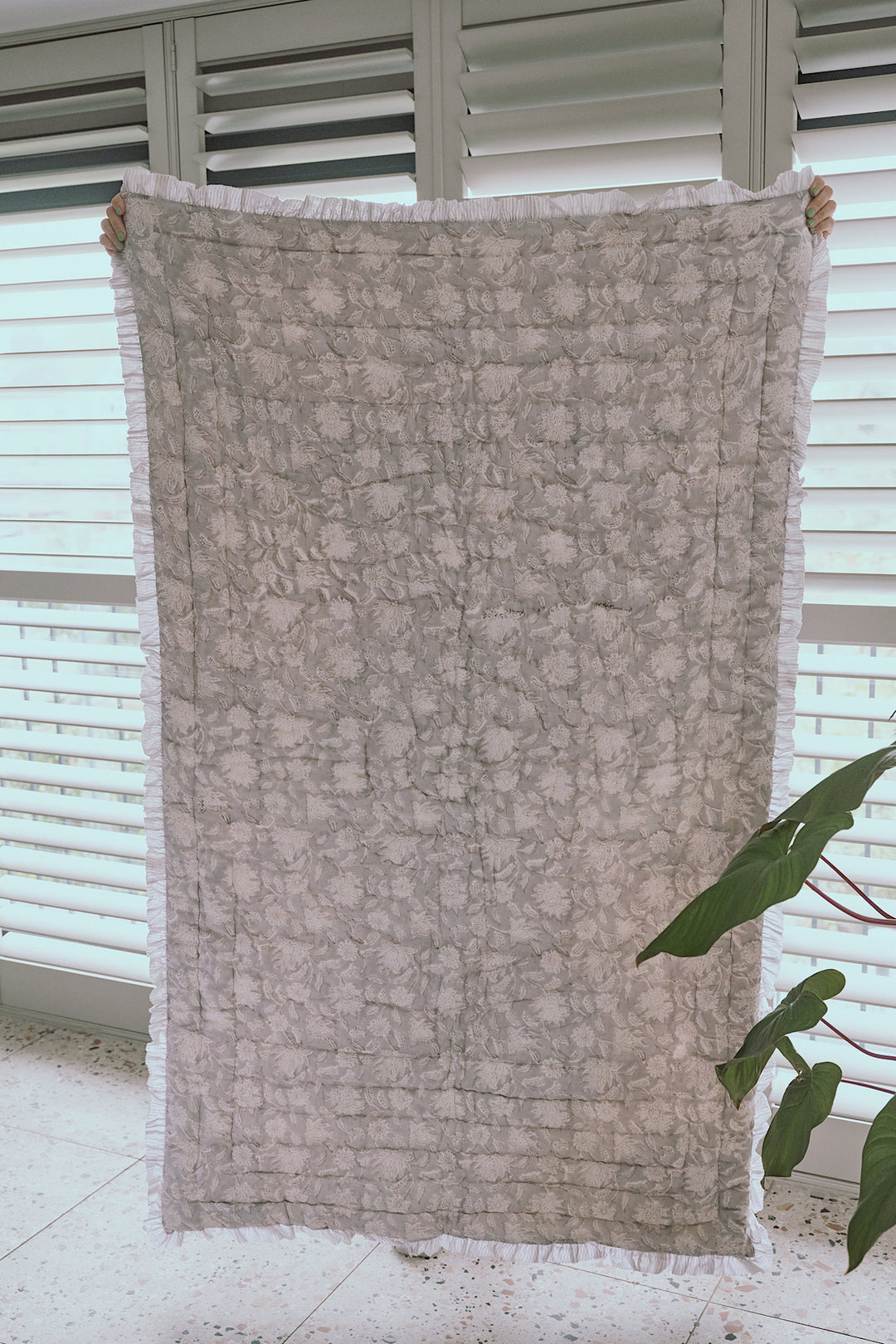 Champaca Ruffle Quilted Throw In Lunar Grey