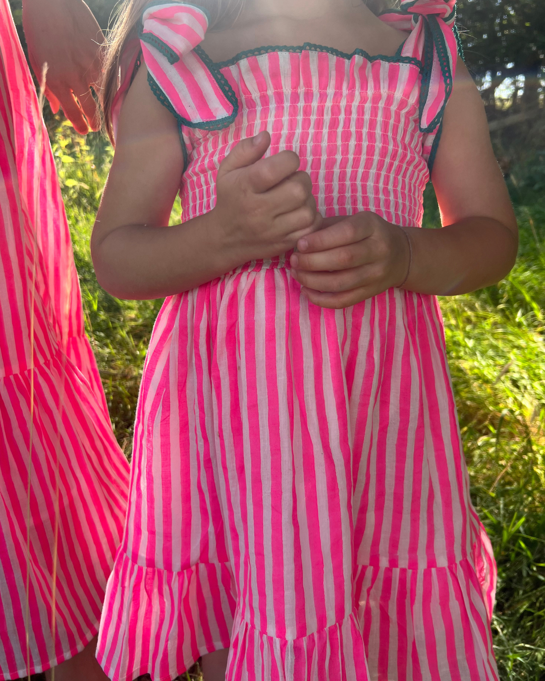 Mini Yasmin Smocked Sundress in Neon Pink - Dilli Grey