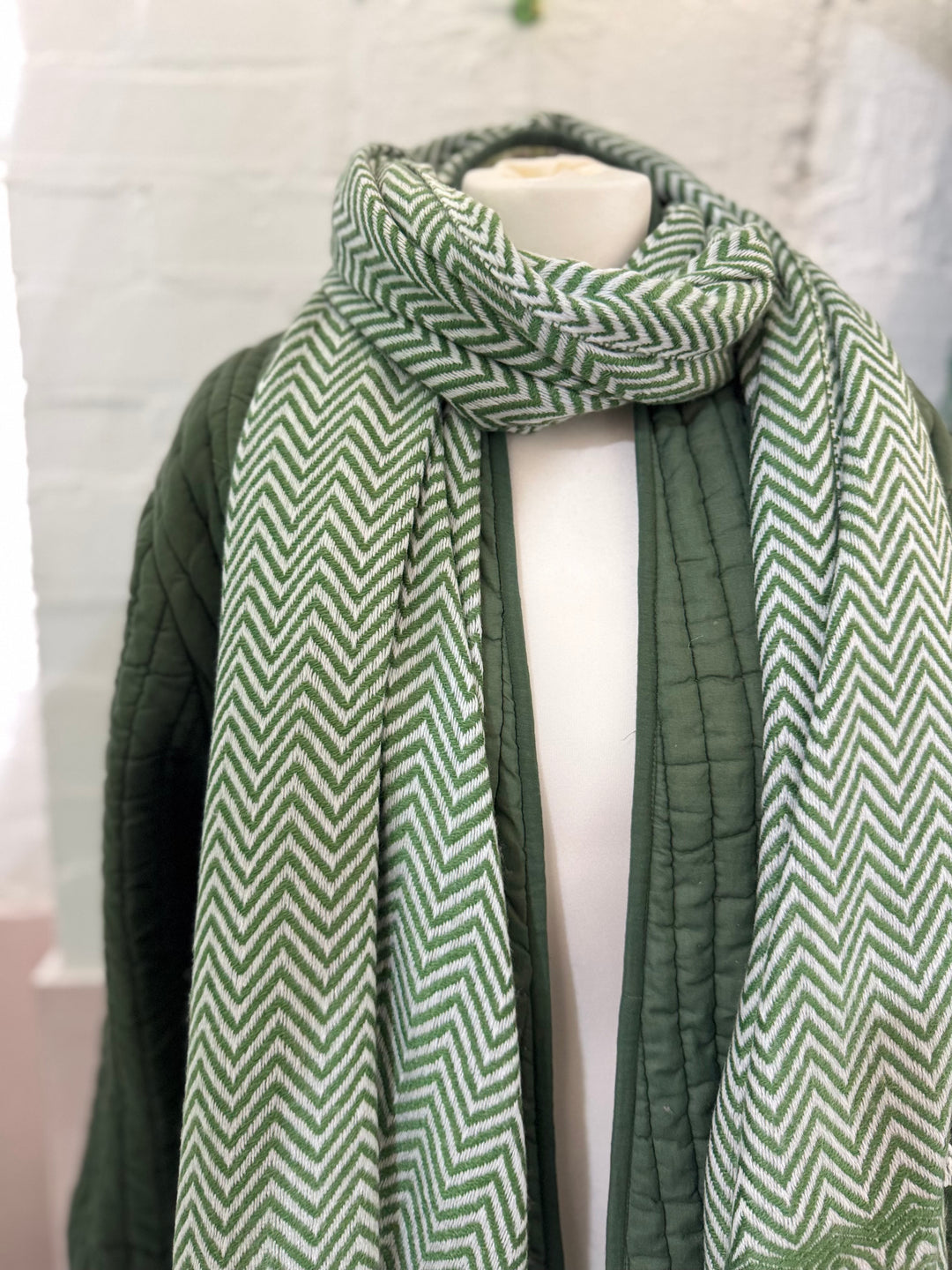 Cashmere chevron scarf in off white and tulsi green