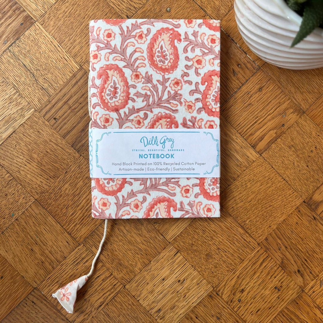 Fabric-covered notebook in peach paisley