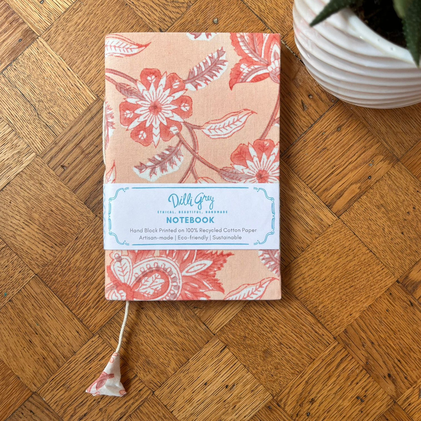 Fabric-covered notebook in peach champaca