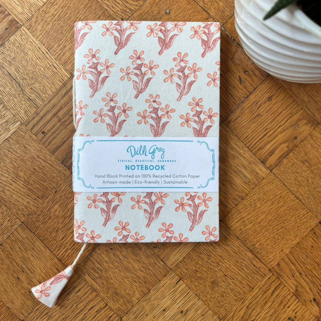 Fabric-covered notebook in peach daisy